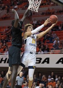 Oklahoma State pulls away late to defeat West Virginia 85-77